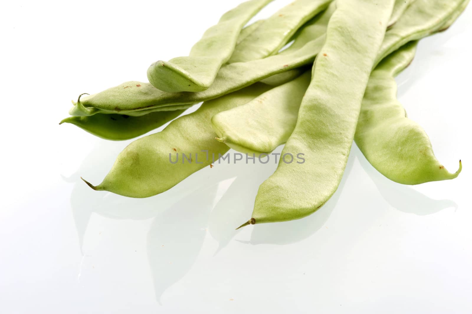 French beans on a white background