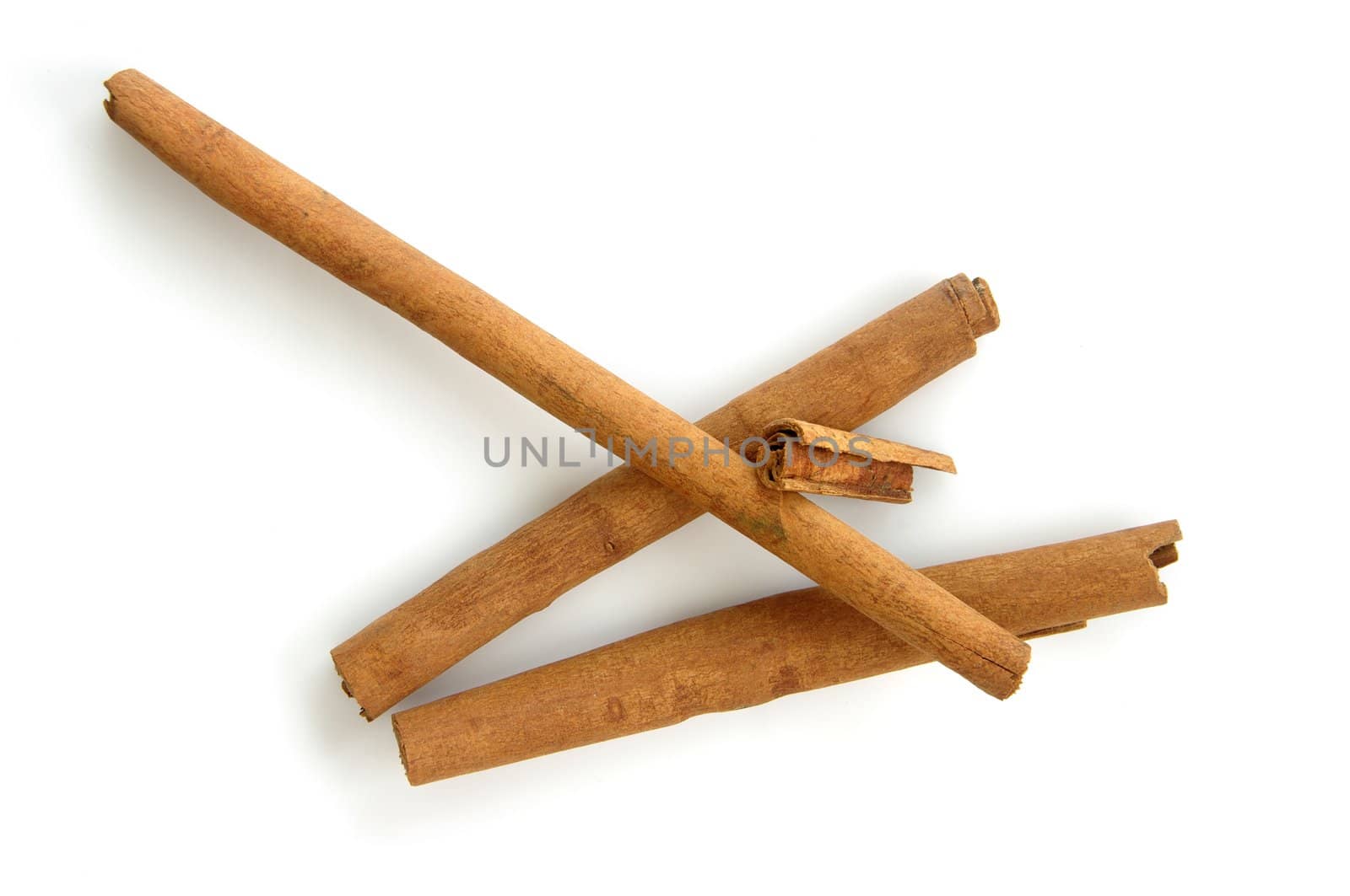 Sticks of Cinnamon (Cinnamomum). Shot on white