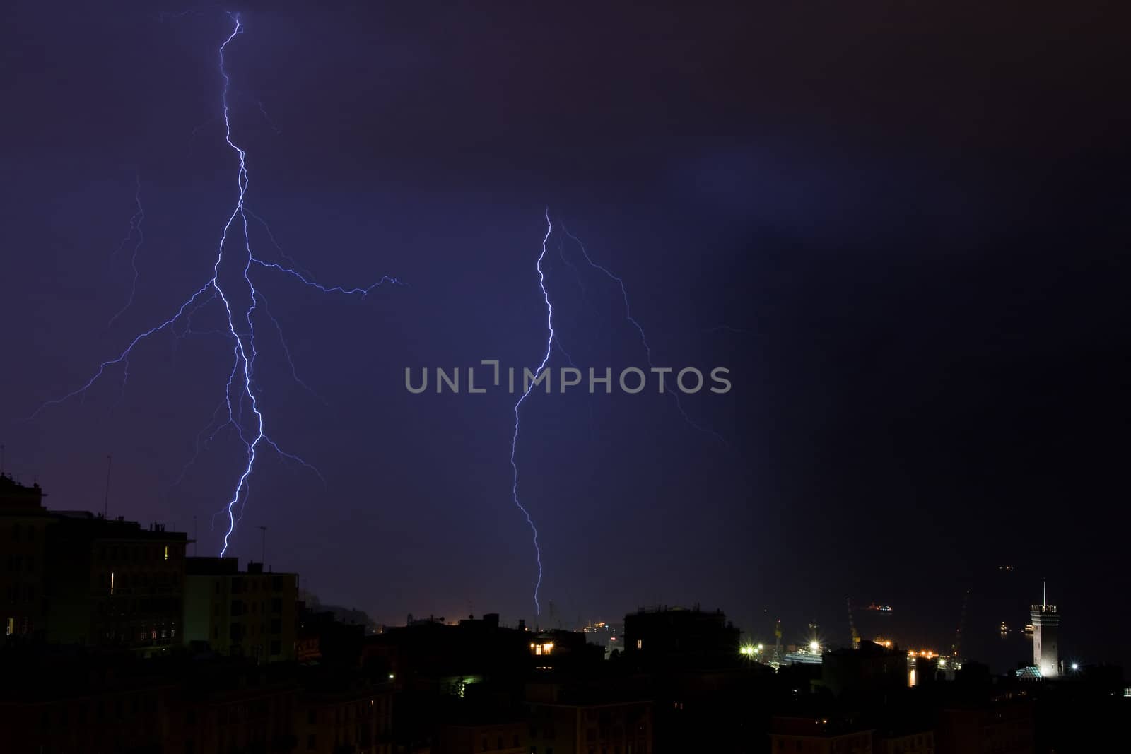Lightning into the sea near the port of Genoa