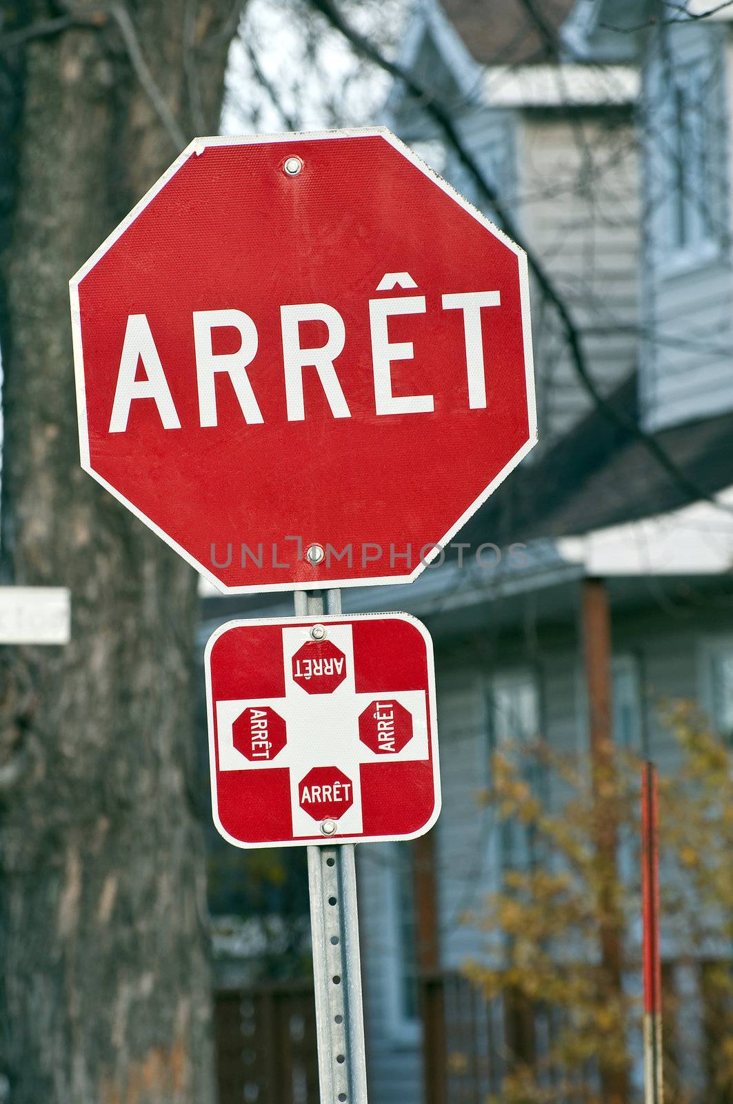 French stop sign, all directions, Quebec, canada.