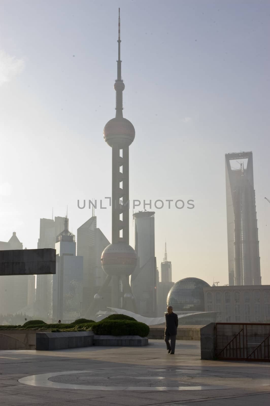 Sunrise on the Bund in Shanghai with view of Oriental Pearl Tower