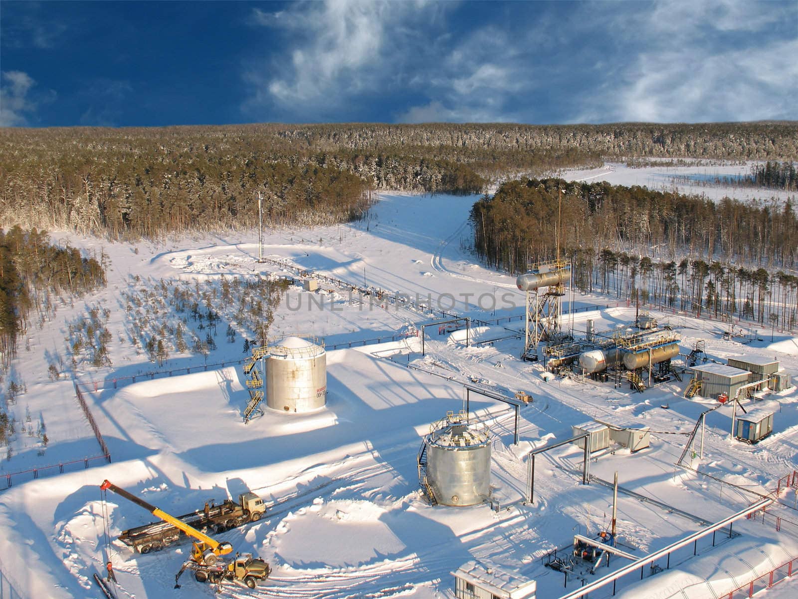 Oil extraction. Oil industry. Construction and mechanism in work. Aerial view.

