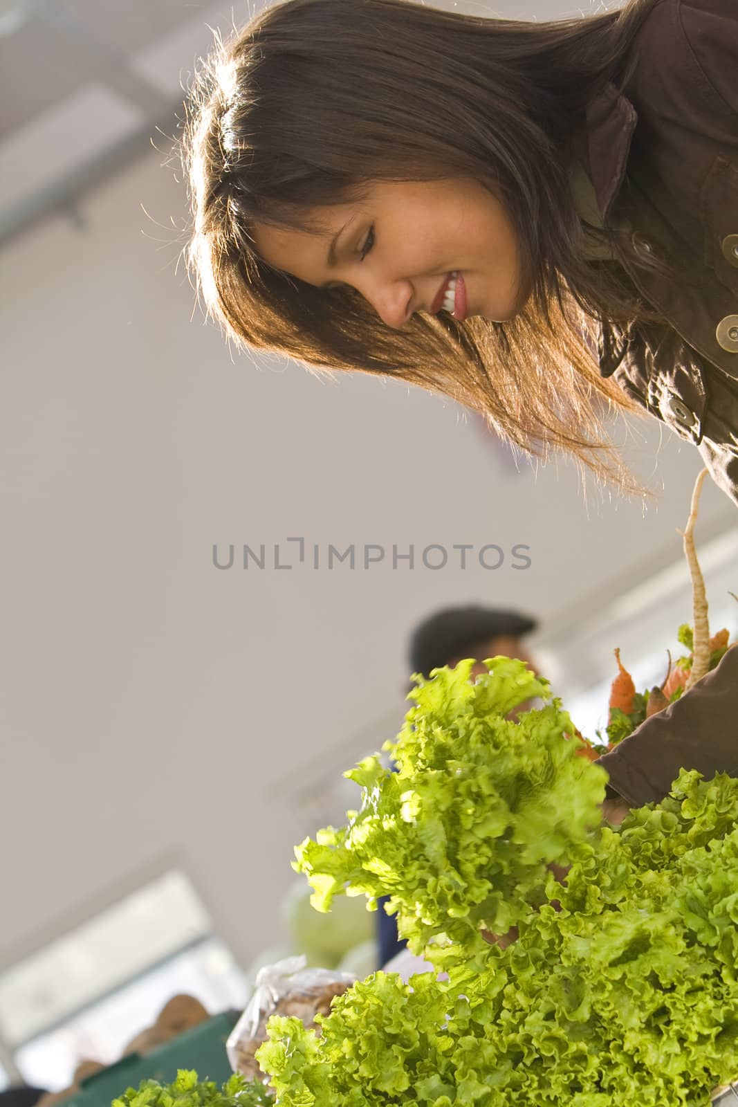 Woman buying salad by RazvanPhotography