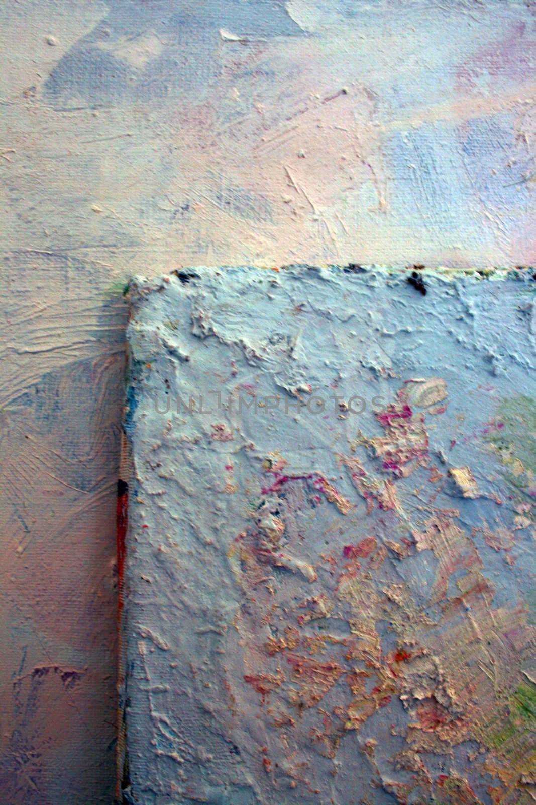 close up a canvas painted over in layers