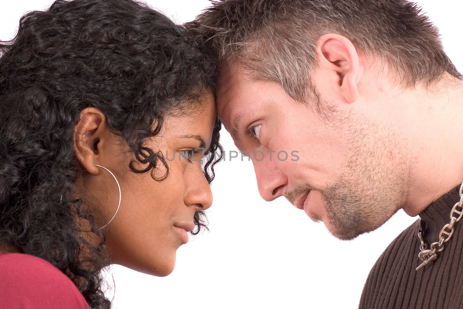 Young couple heads close together
