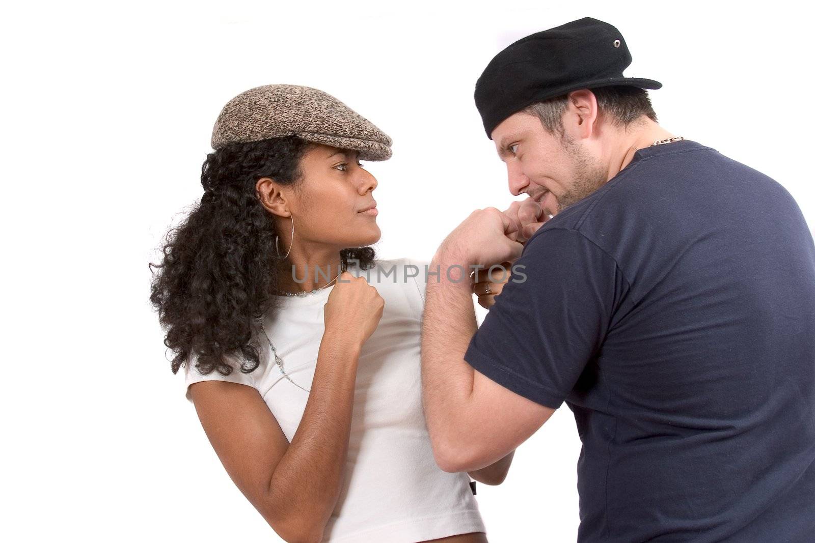 Young diverse couple in a mock fight