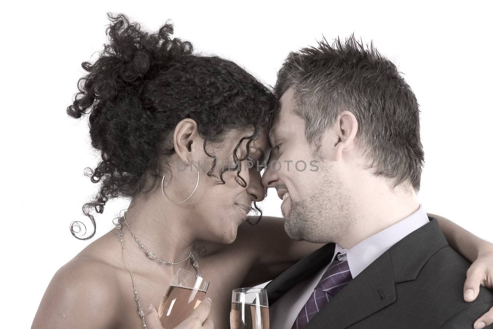 Loving young couple at a party