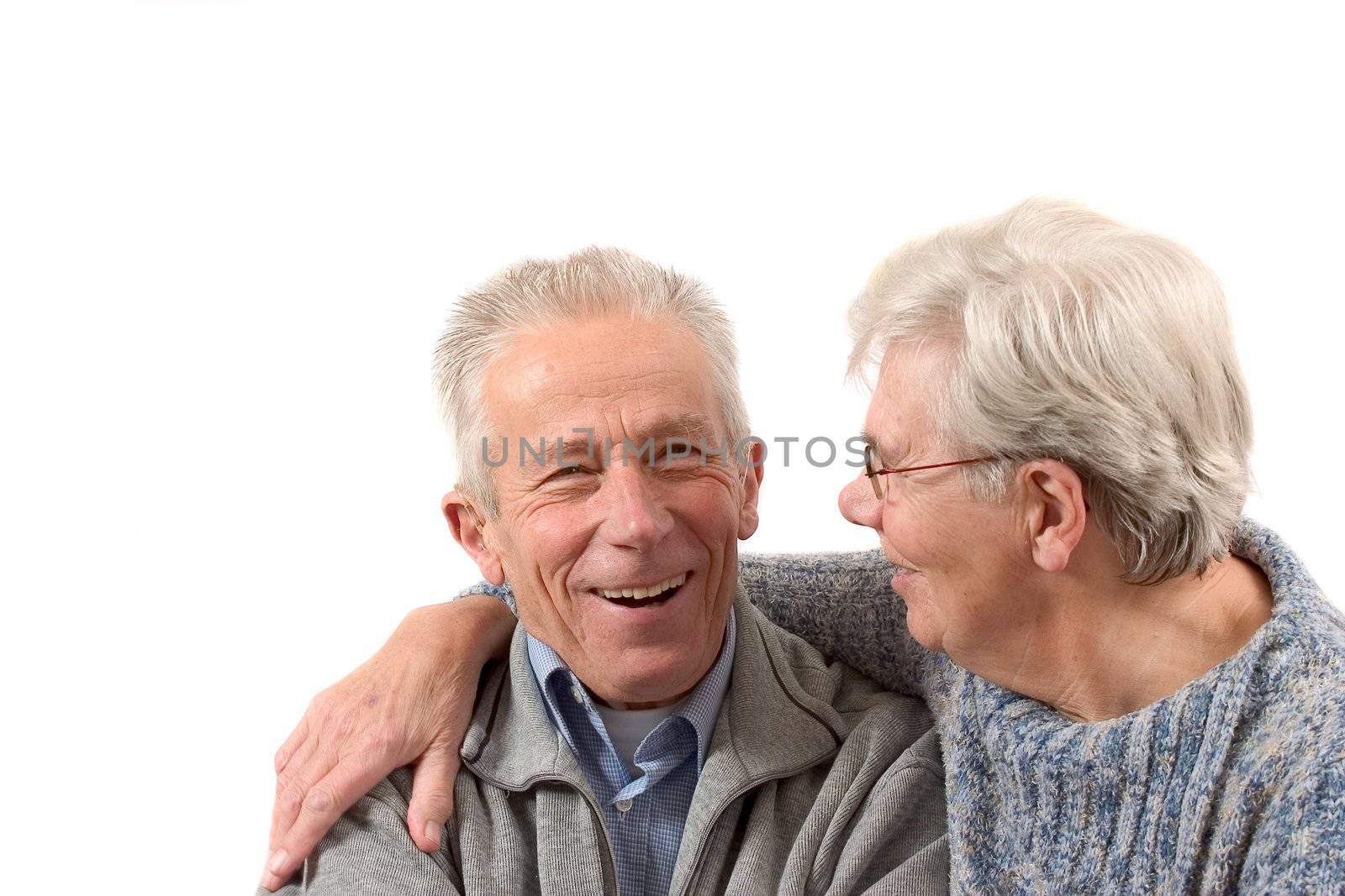 Older couple having a laugh by Fotosmurf