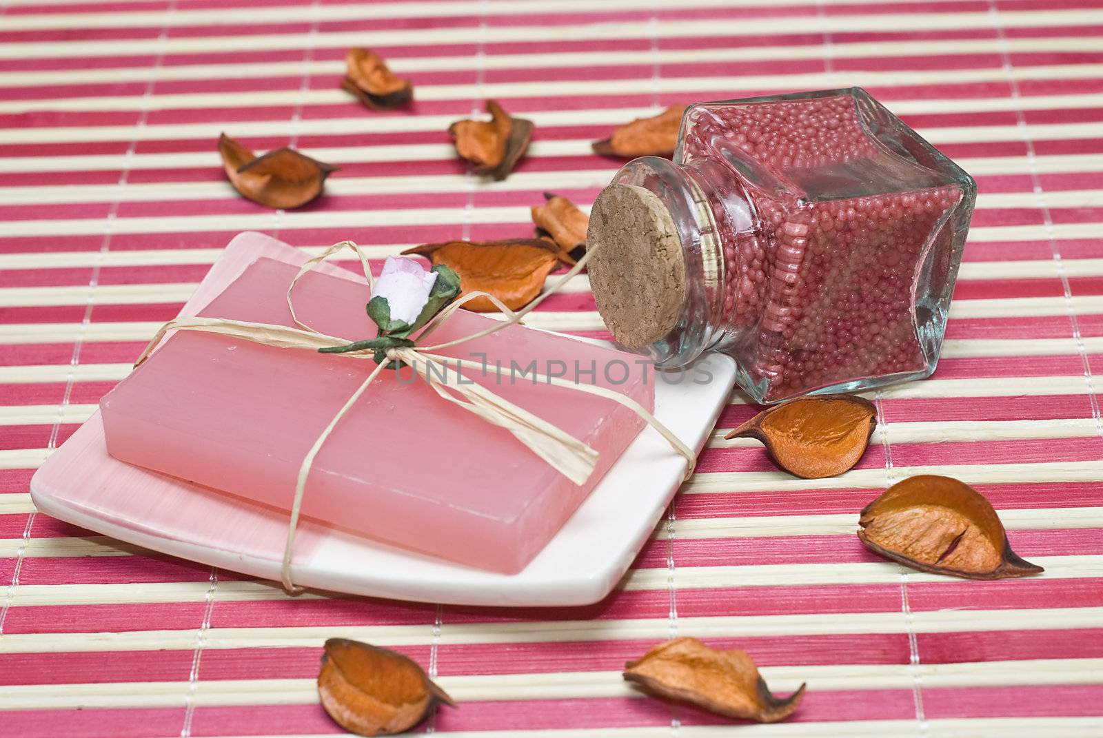 Still life about spa with some hygiene items in red.