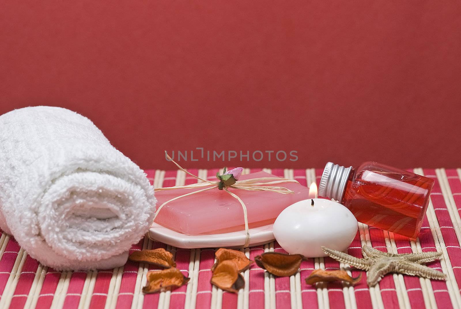 Still life about spa with some hygiene items in red.