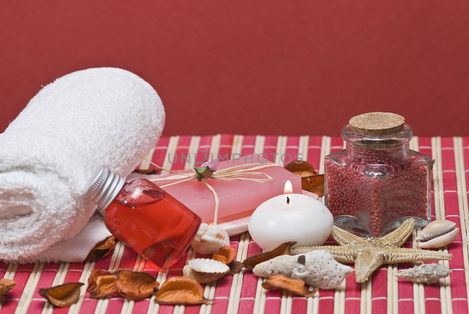 Still life about spa with some hygiene items in red.