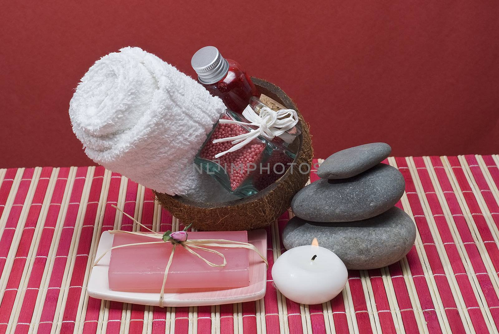 Still life about spa with some hygiene items in red.