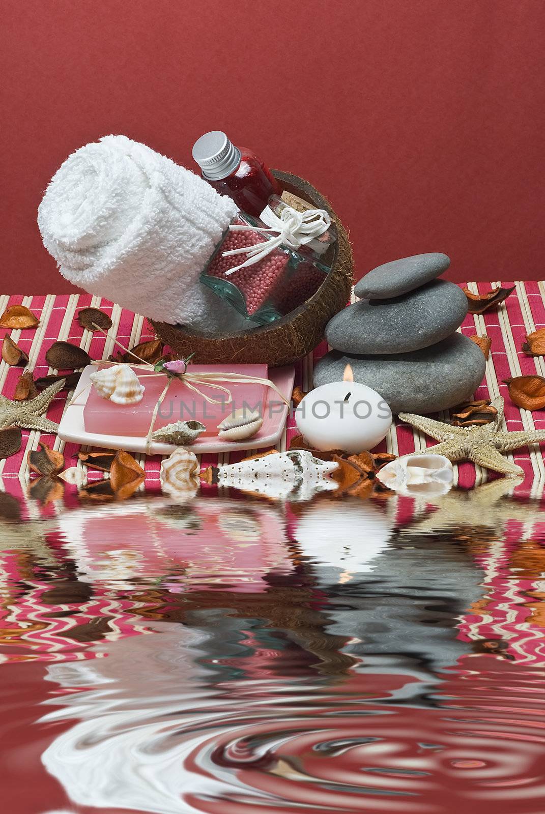 Still life about spa with some hygiene items in red.