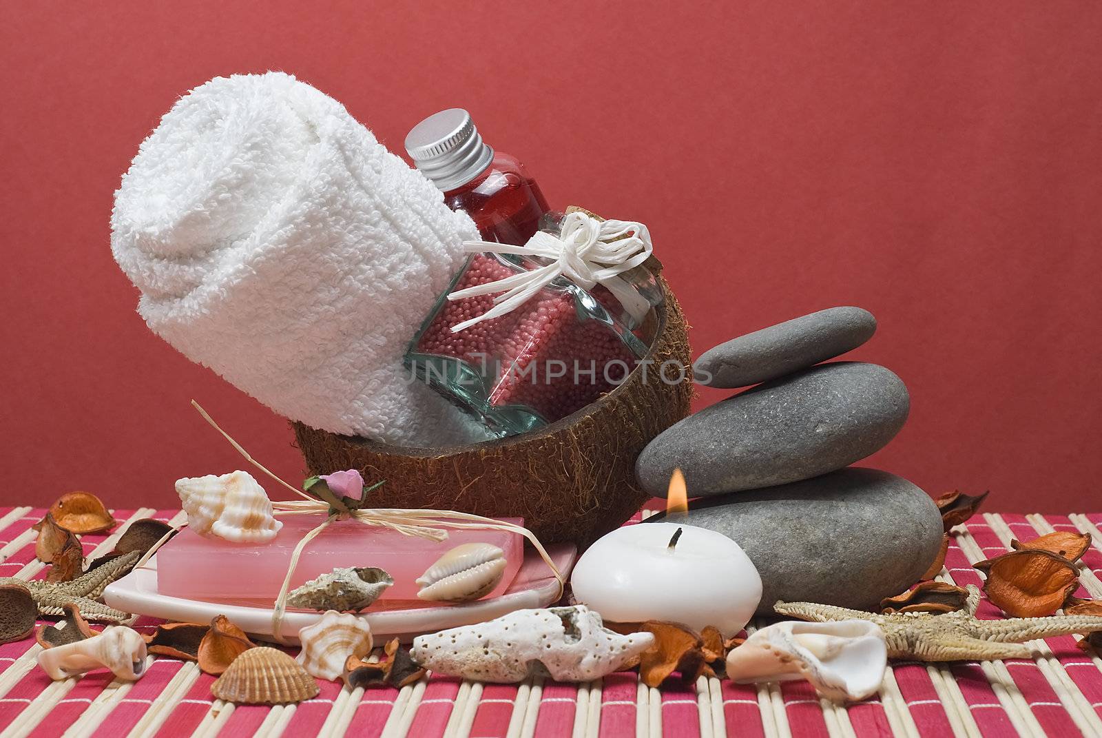 Still life about spa with some hygiene items in red.