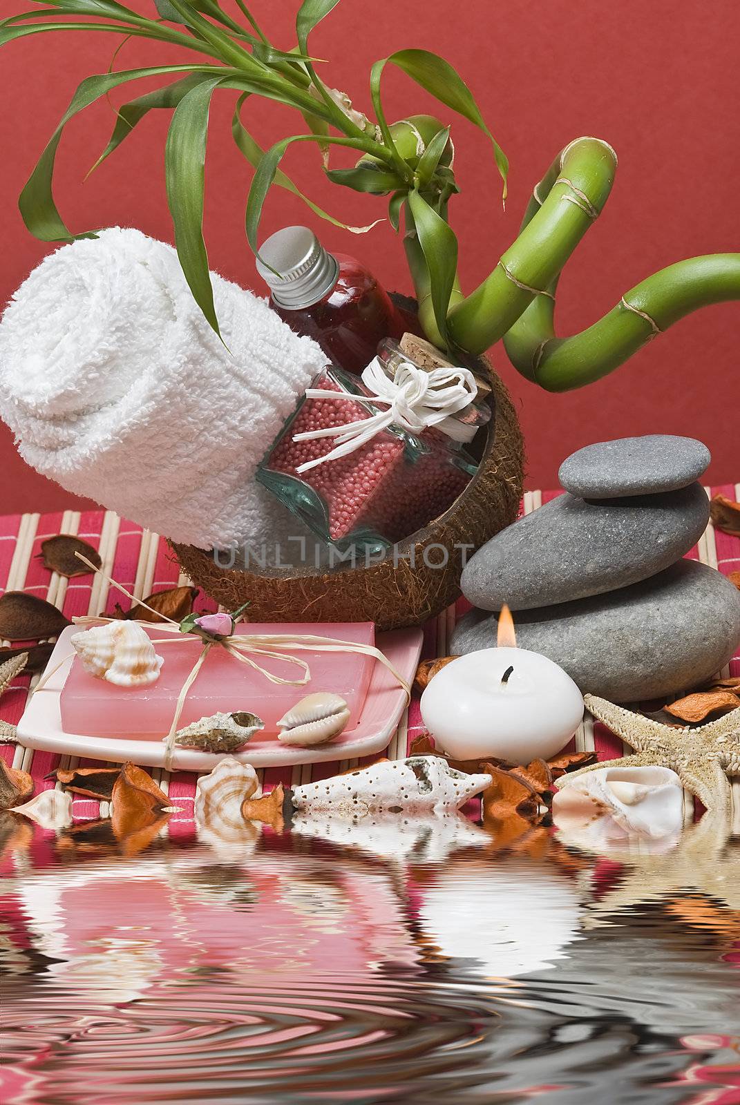 Still life about spa with some hygiene items in red.