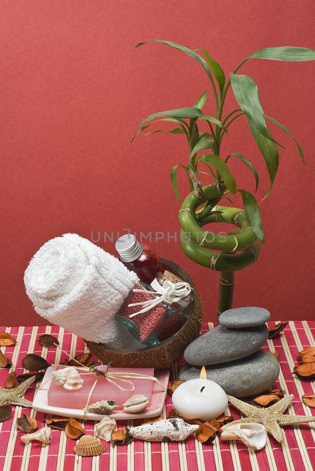 Still life about spa with some hygiene items in red.