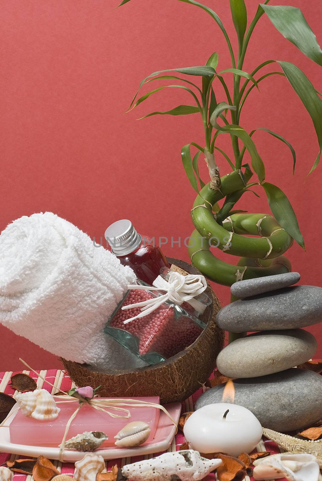 Still life about spa with some hygiene items in red.