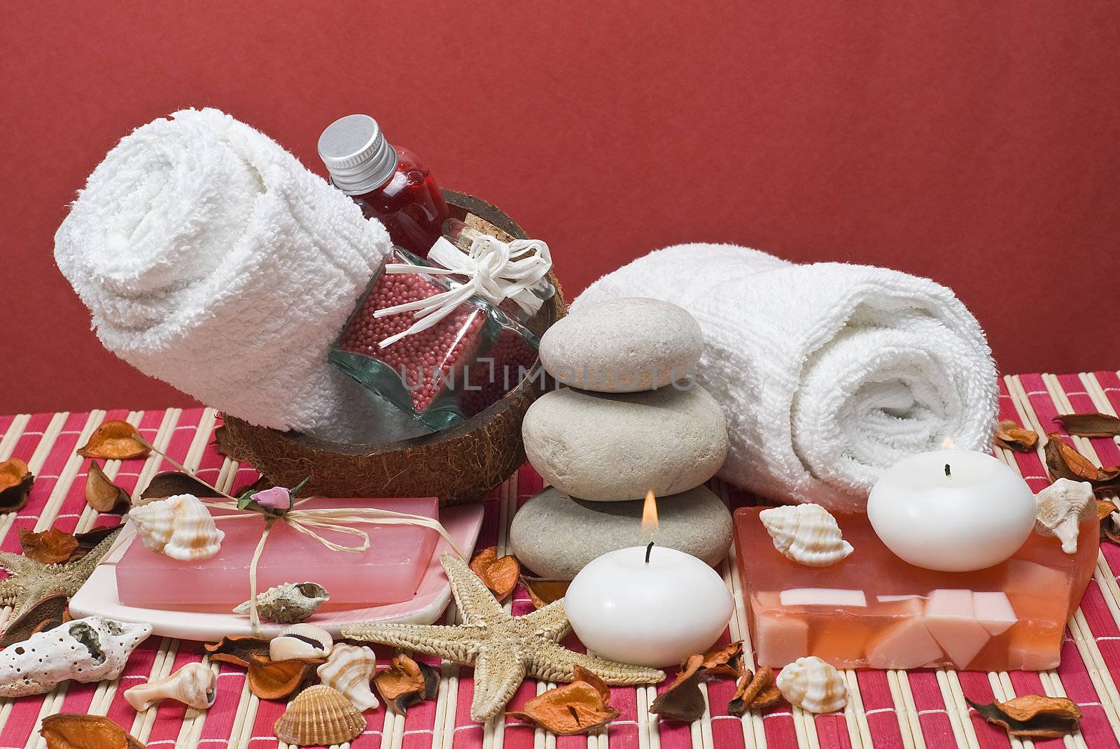 Still life about spa with some hygiene items in red.