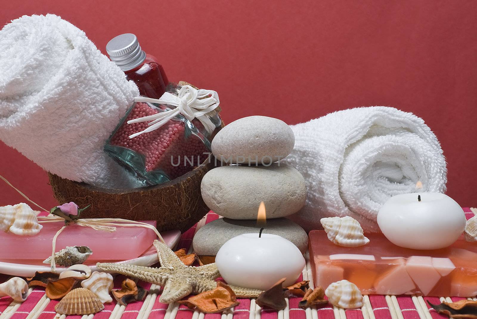 Still life about spa with some hygiene items in red.