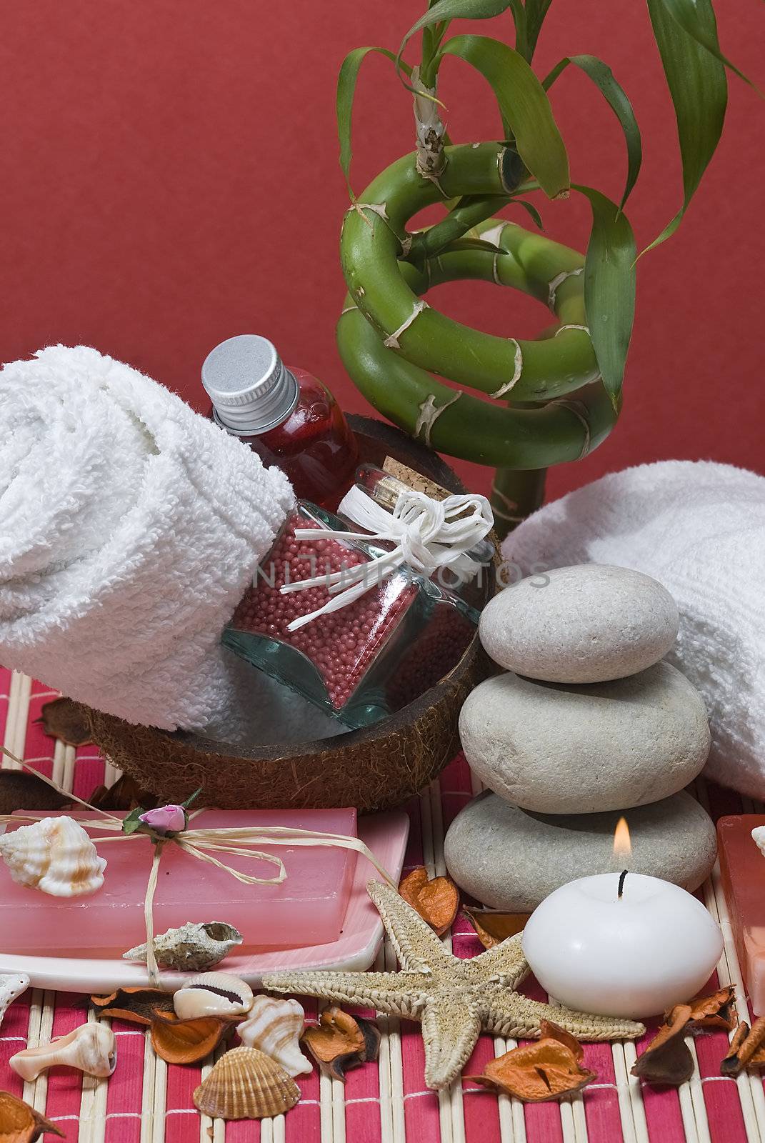 Still life about spa with some hygiene items in red.