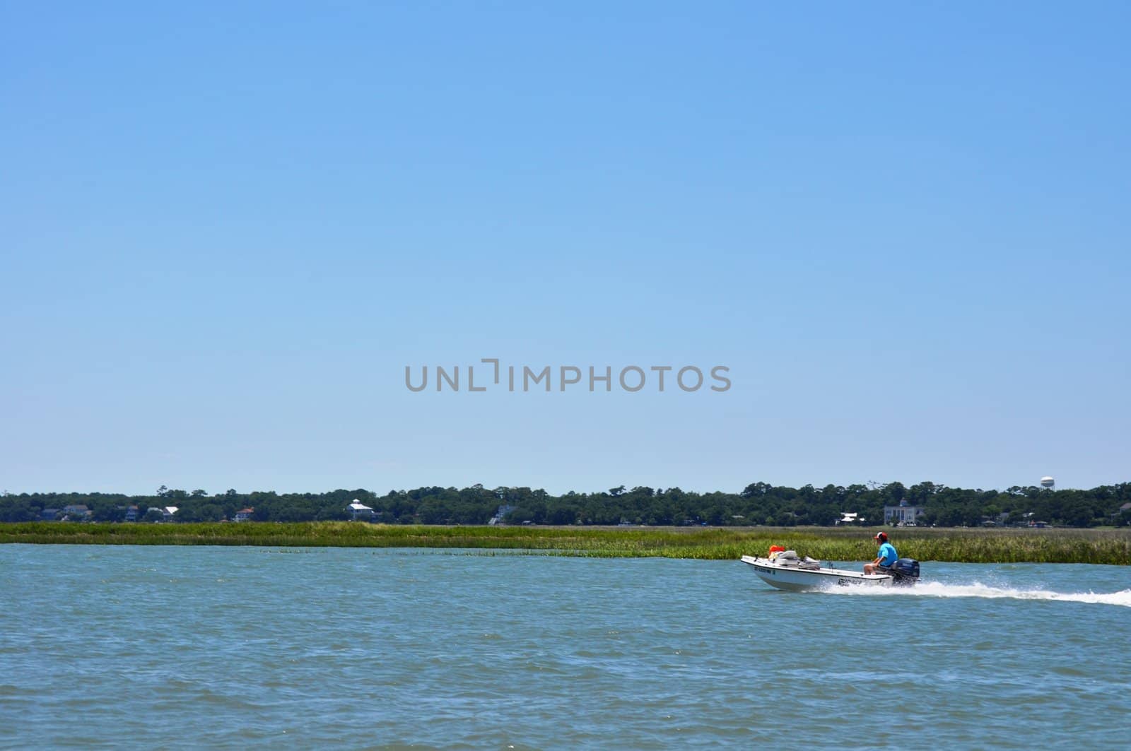 Boat on the water by RefocusPhoto