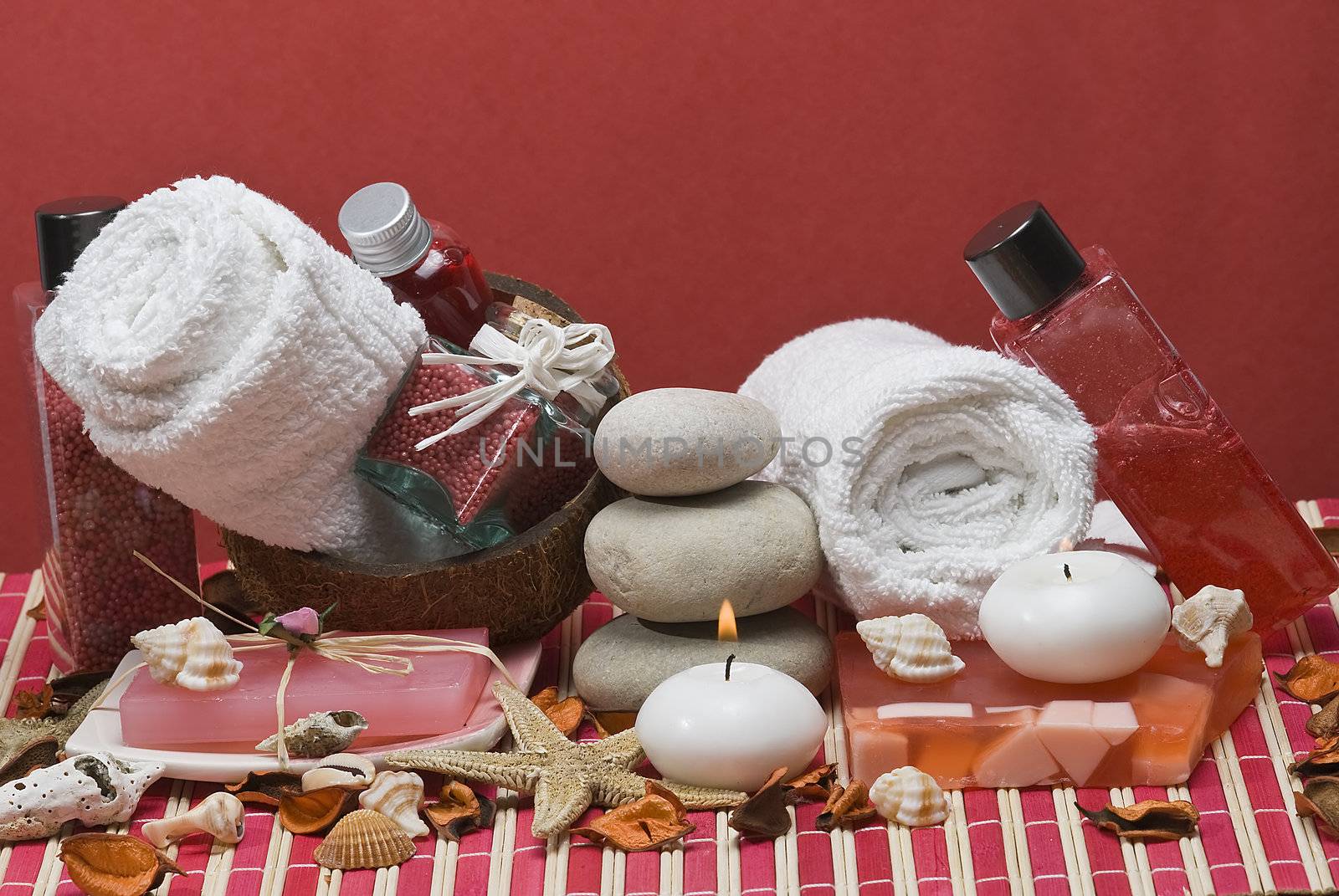 Still life about spa with some hygiene items in red.