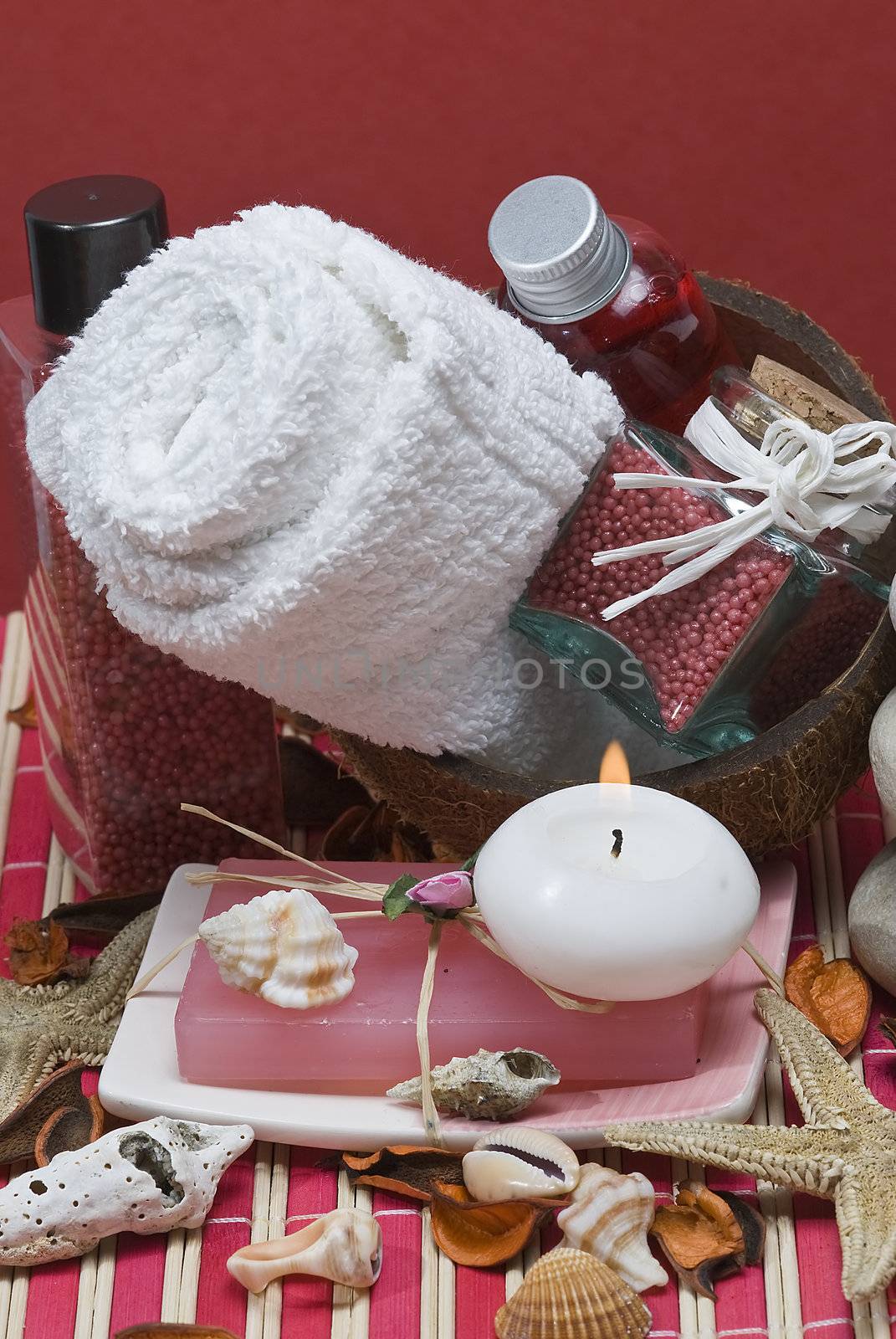 Still life about spa with some hygiene items in red.