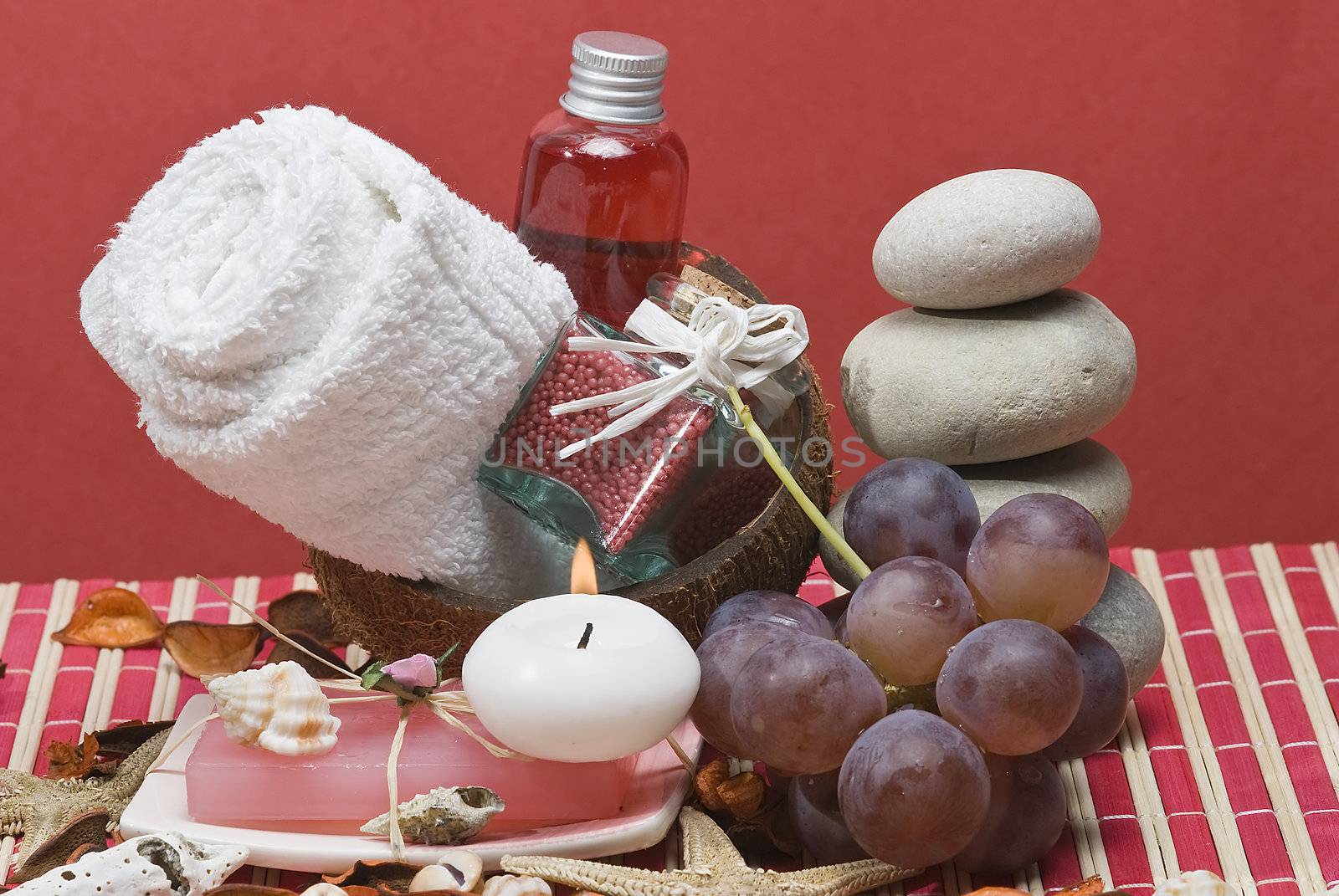 Still life about spa with some hygiene items in red.