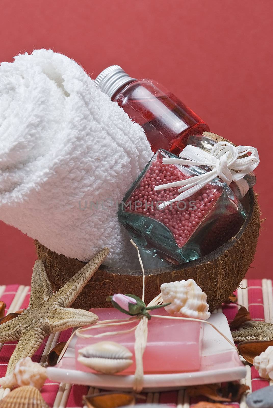 Still life about spa with some hygiene items in red.