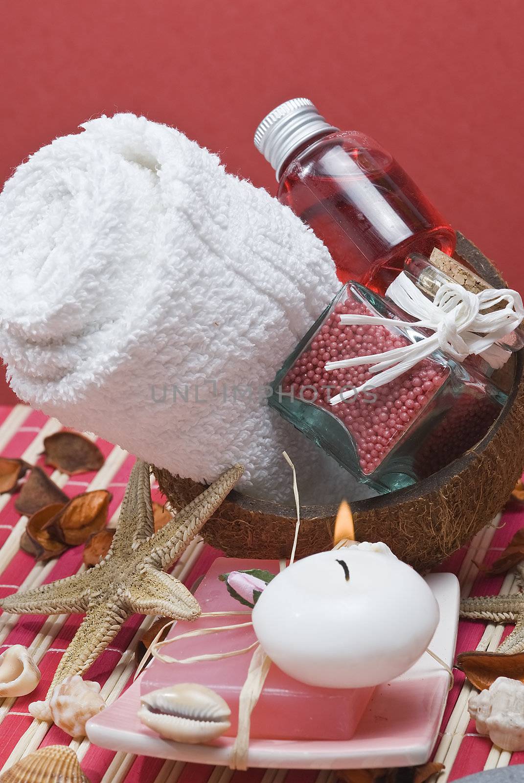 Still life about spa with some hygiene items in red.