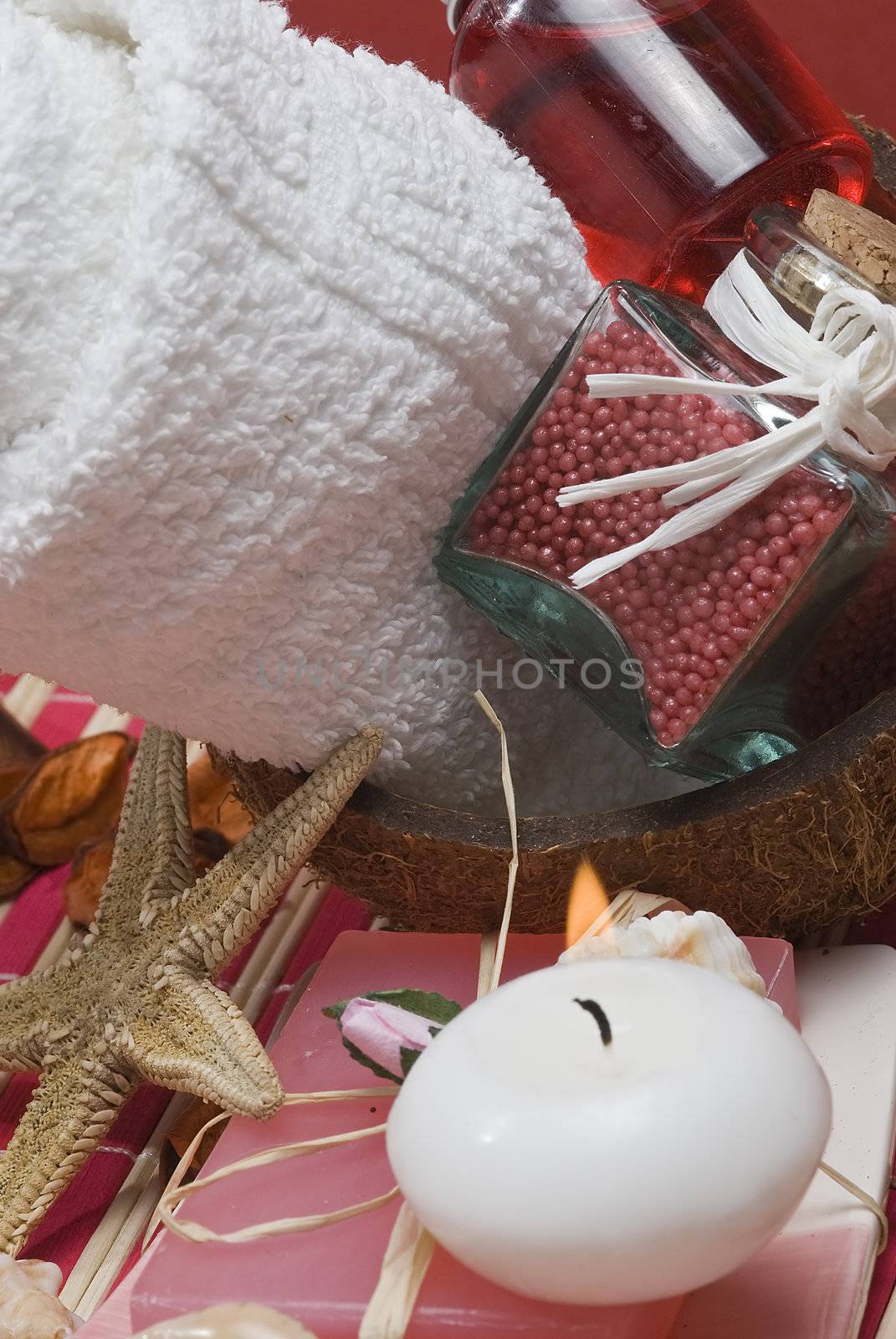 Still life about spa with some hygiene items in red.