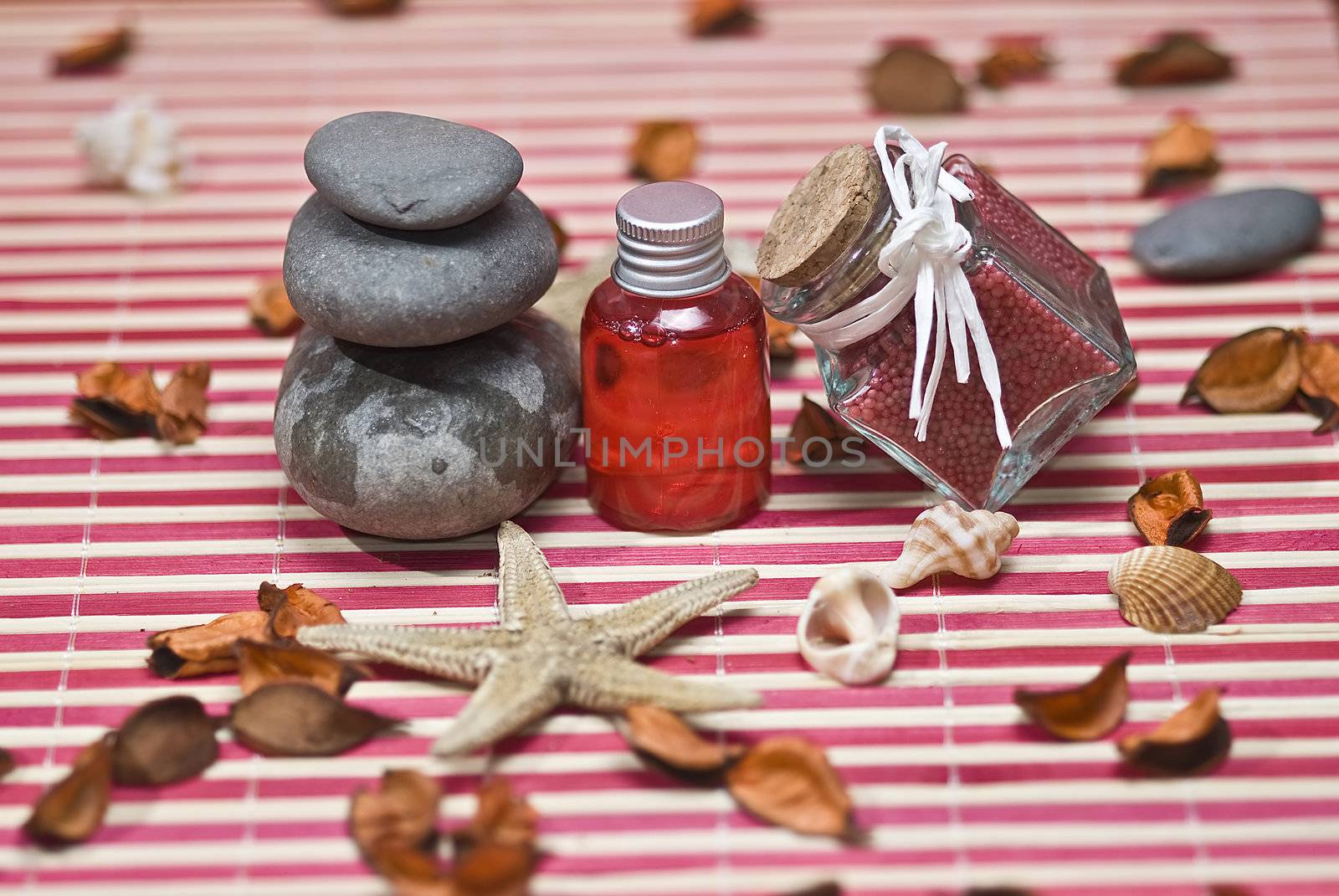 Still life about spa with some hygiene items in red.