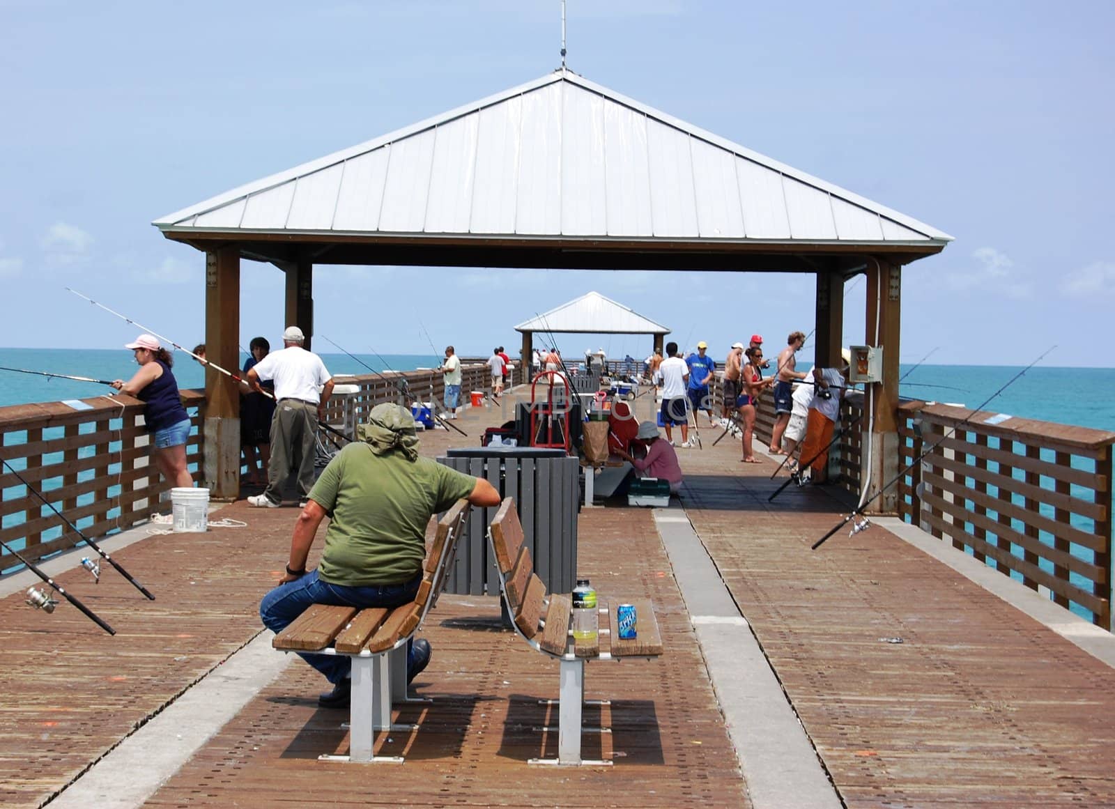 Men fishing on pier