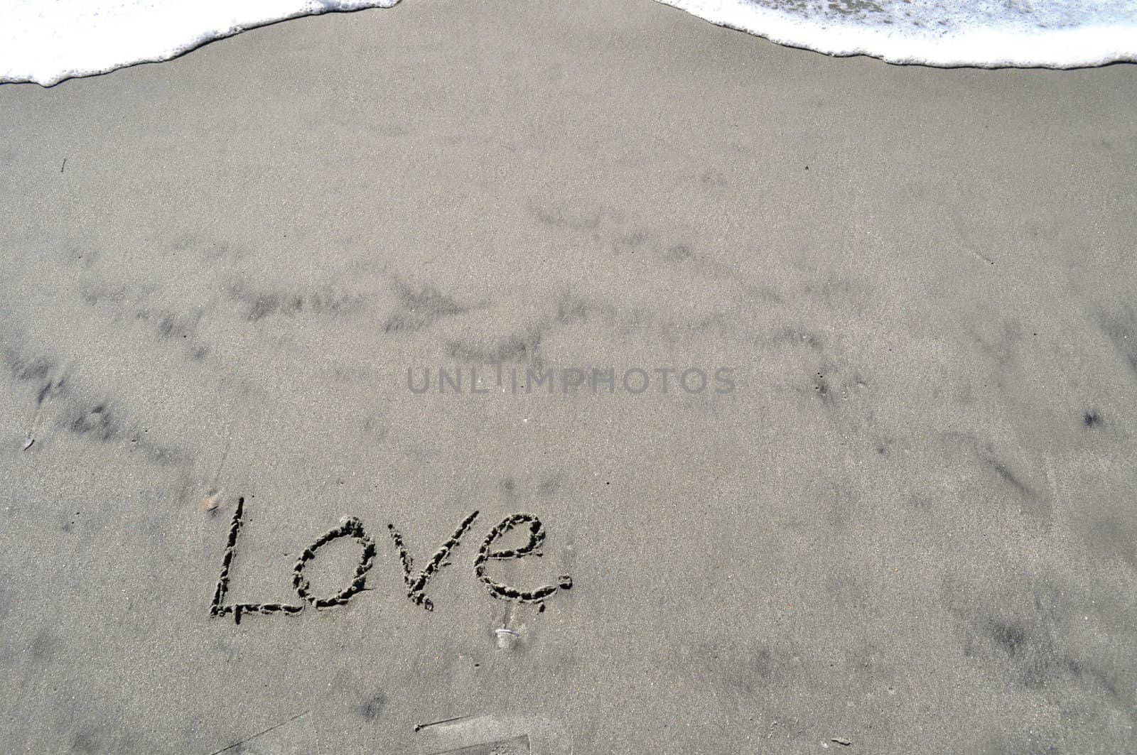 Love In the Sand by RefocusPhoto