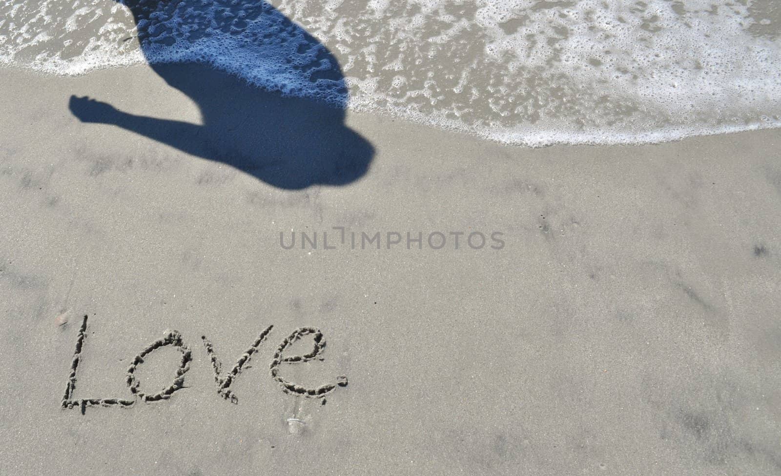 Love In the Sand by RefocusPhoto