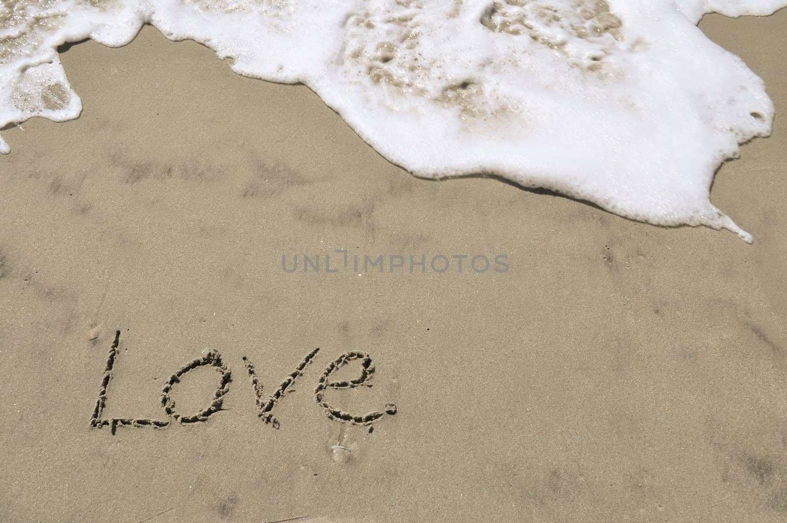 Love In the Sand by RefocusPhoto