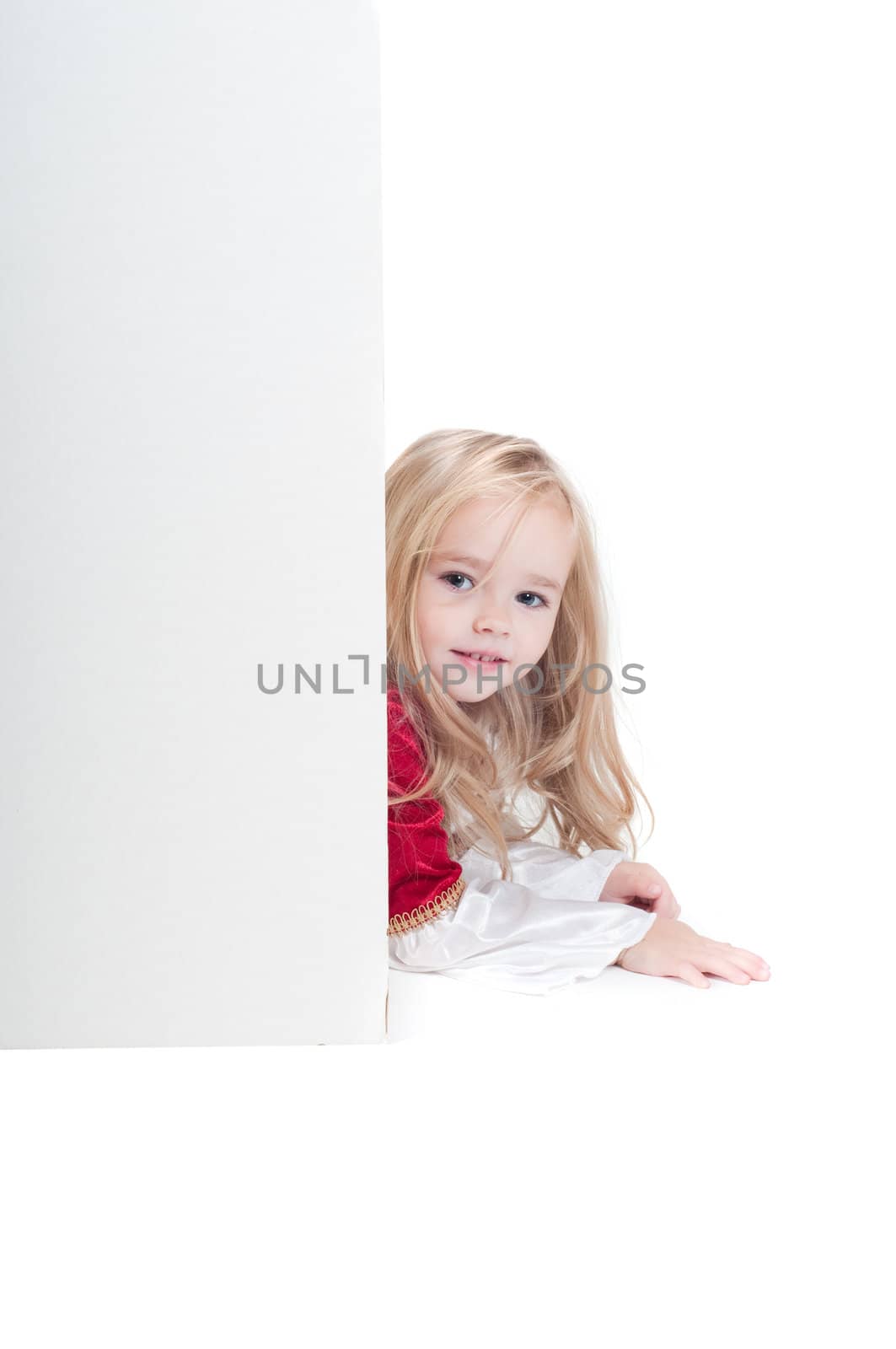 Beautiful baby girl dressed up for Christmas isolated in white