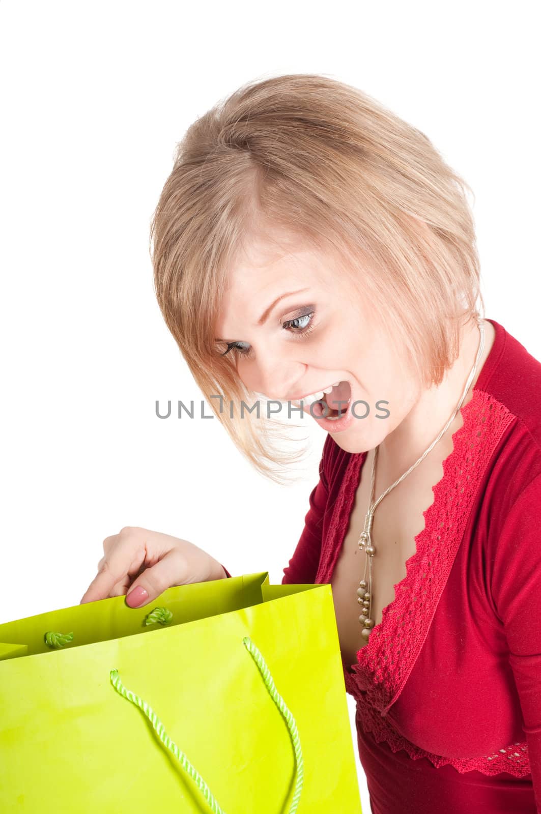 Beautiful woman with shopping bags isolated on white