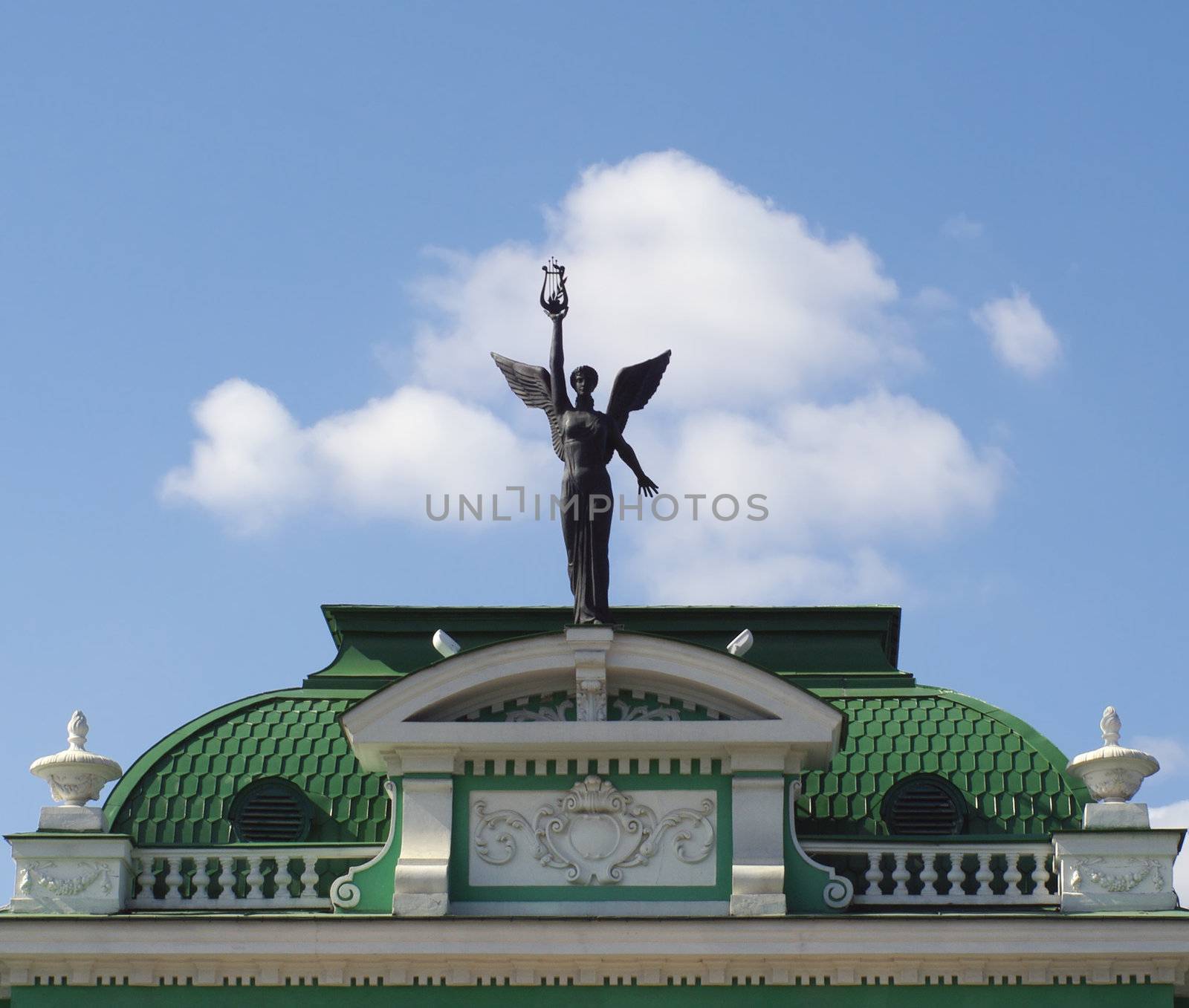 sculpture "winged genius" on  attic of  theatre by HGalina