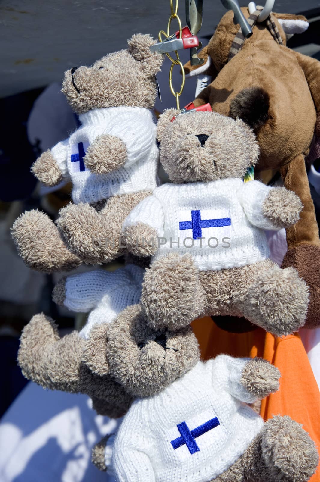 Toy souvenir bears in a bench of gifts in Finland