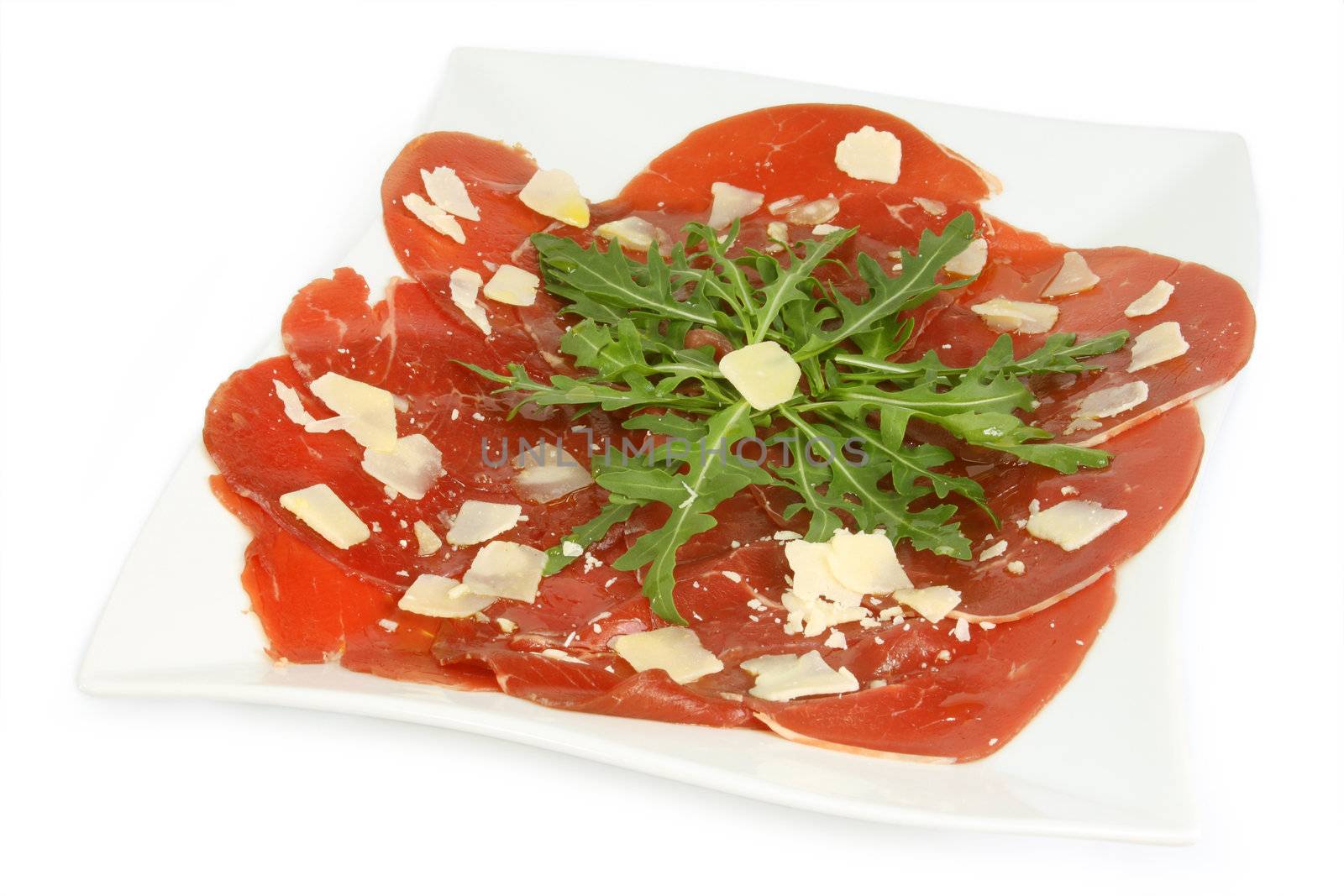 Beef carpaccio with pepper, rucola and parmesan