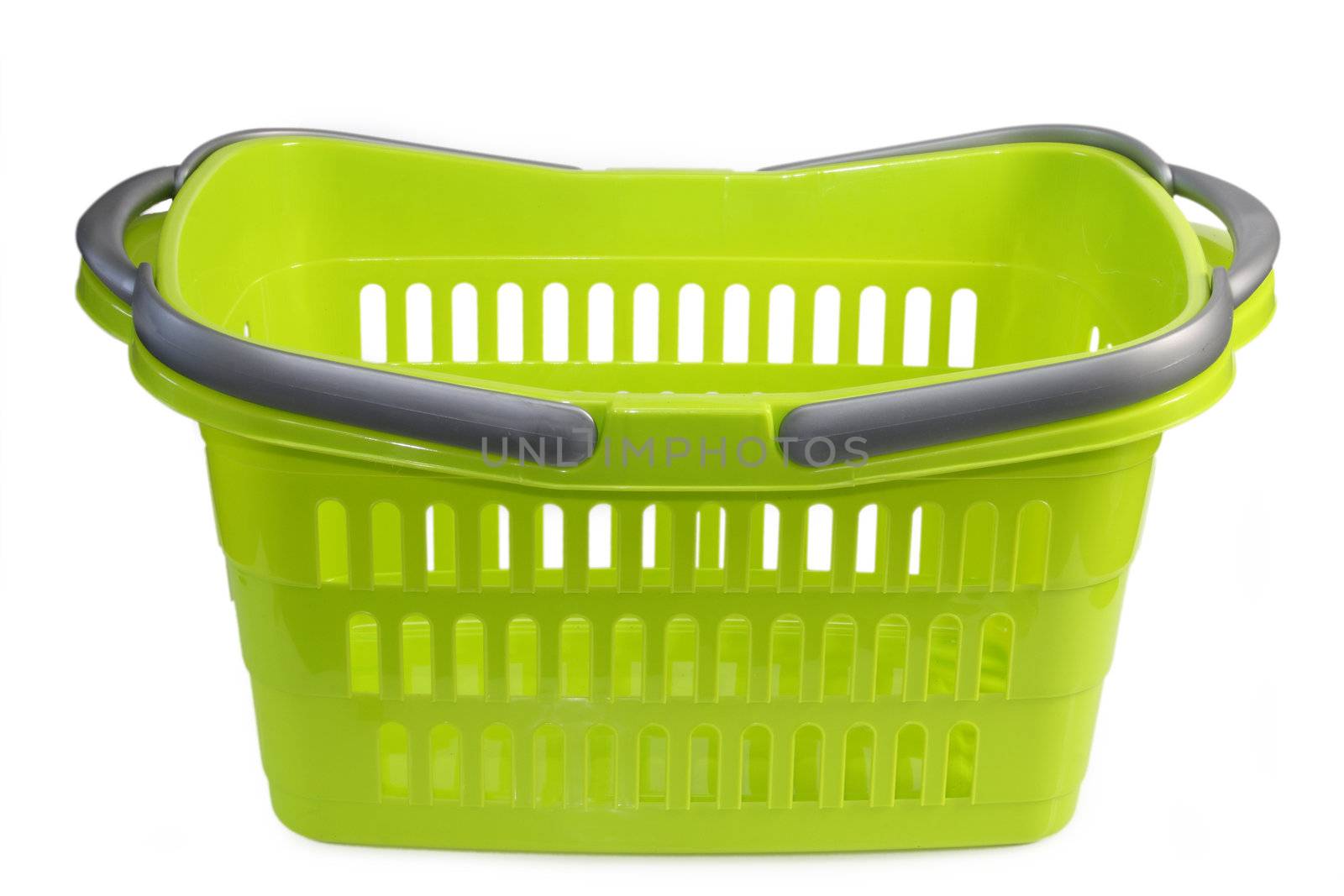 Green plastic shopping basket isolated on whtie background