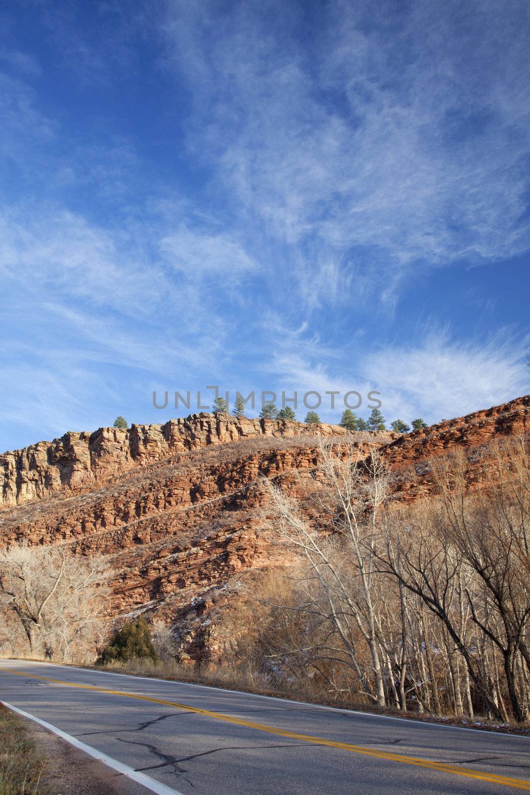 highway in northern Colorado near Fort Collins with redstone cliffs, late fall scenery
