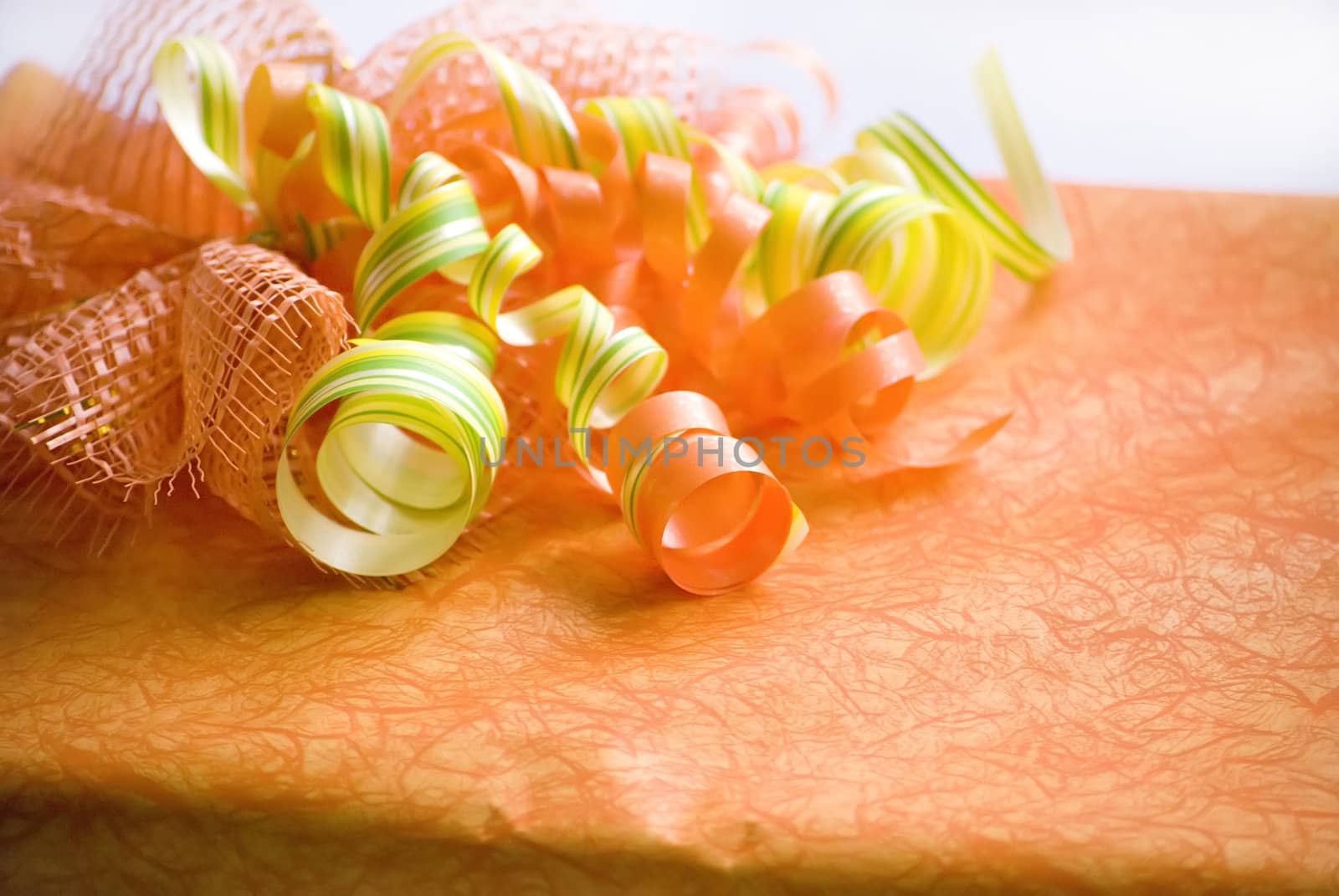 orange decorated gift box with ribbon