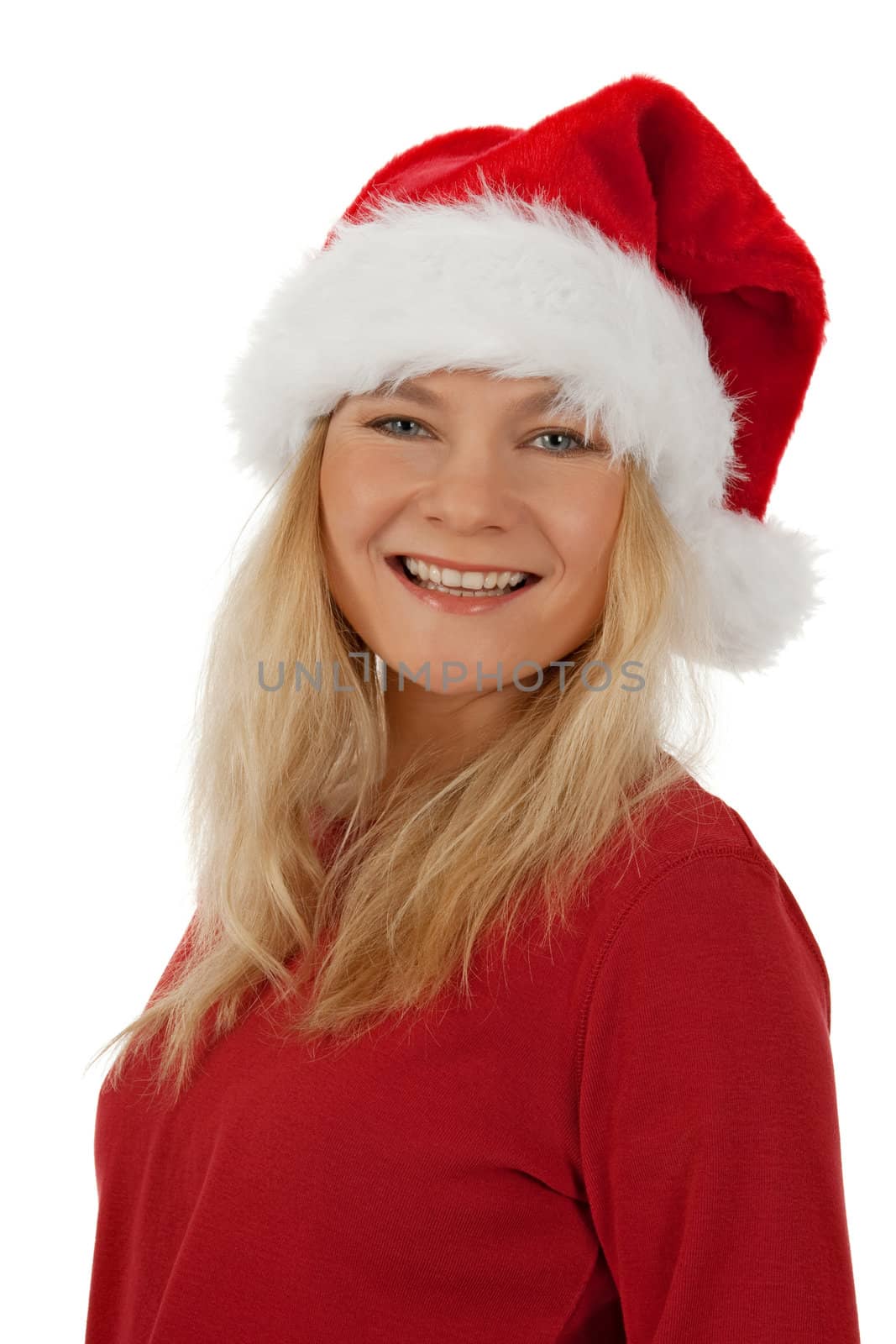 Portrait of a beautiful smiling Christmas girl wearing Santa hat, isolated on white.