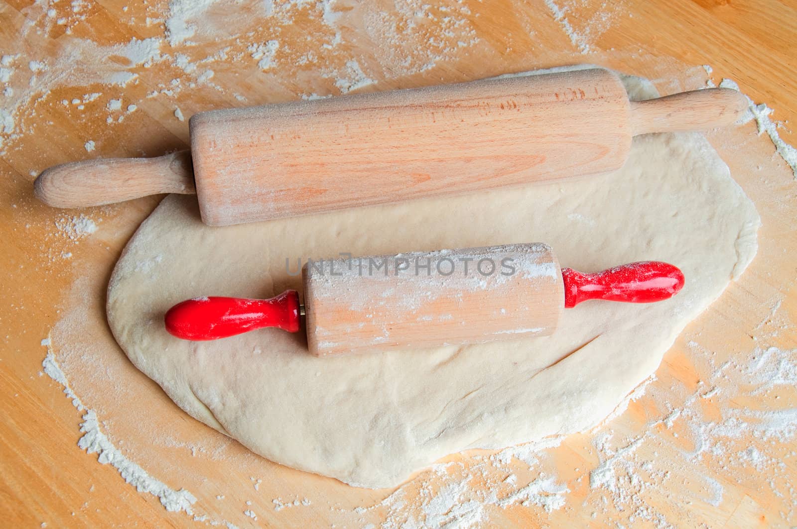One adult rolling pin and one for children