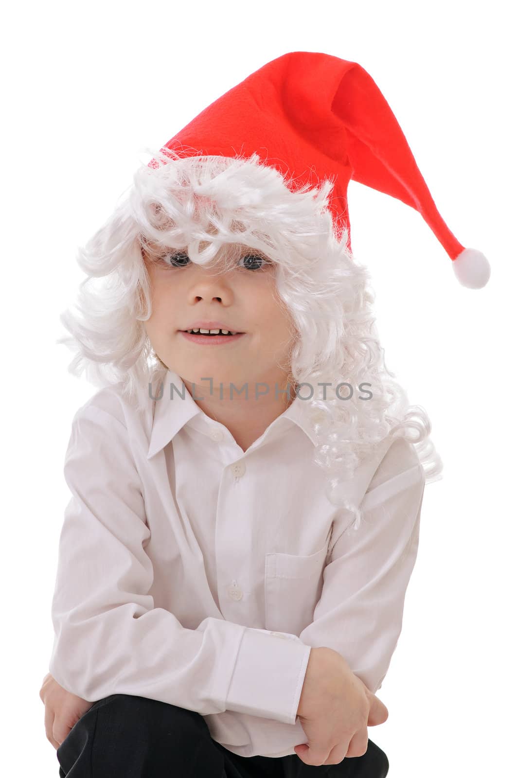 The child in a hat santa claus isolated on white background