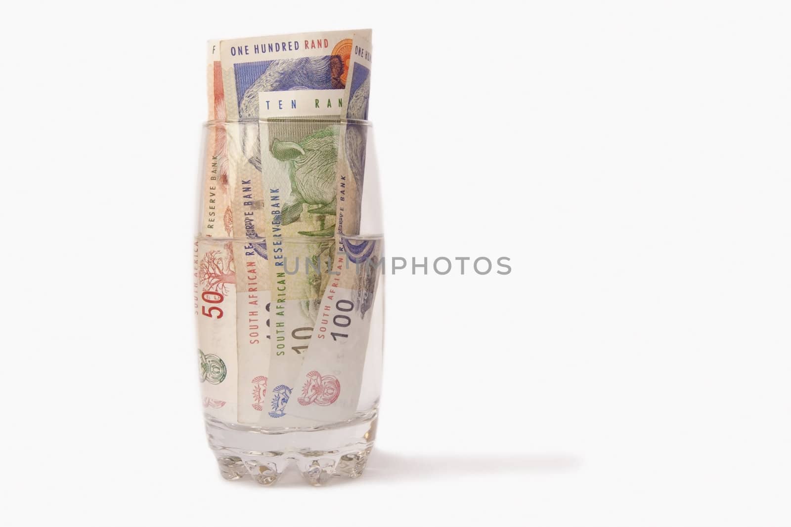 Money in a glass of water