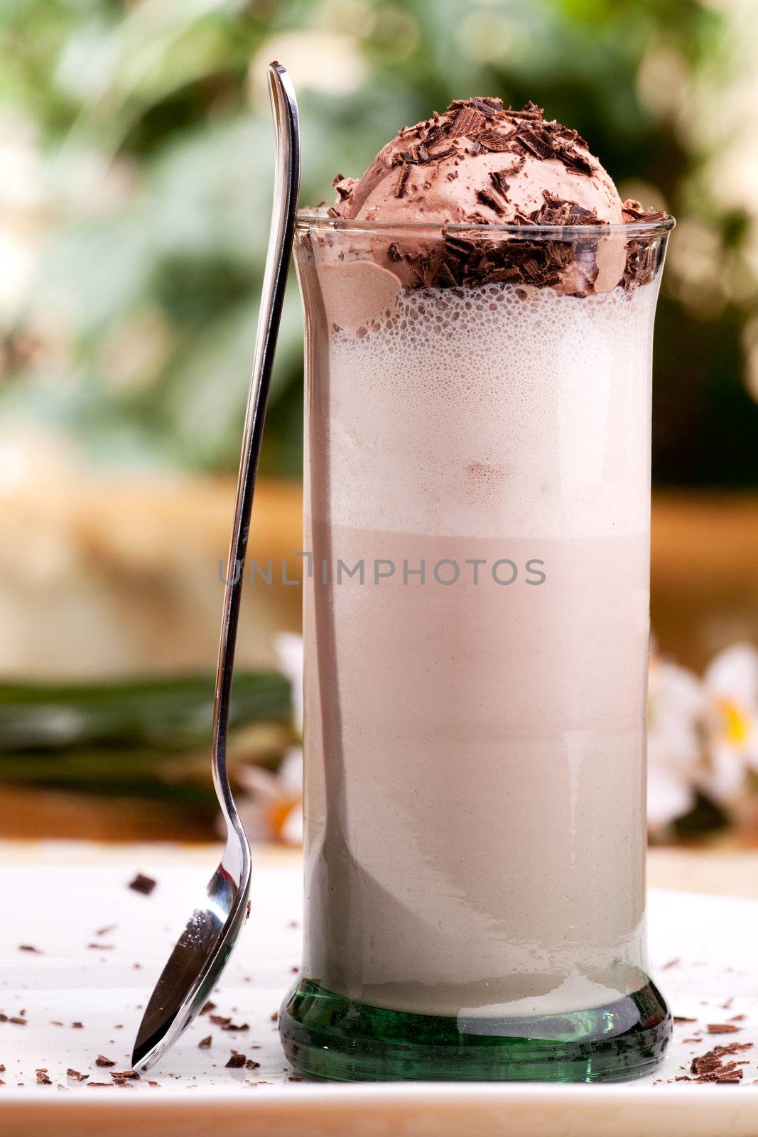 A chocolate milk float in an outdoor natural setting