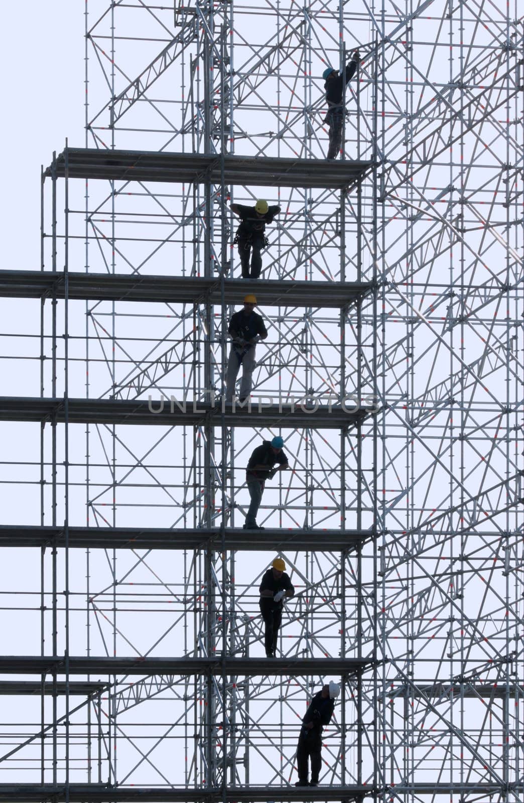 Constructive work builds on a metal stand structure.